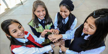 Girls attend the Martin Cardenas School in Cochabamba, Bolivia, a school supported by Save the Children sponsorship programs. Photo Credit: Susan Warner/Save the Children 2015.