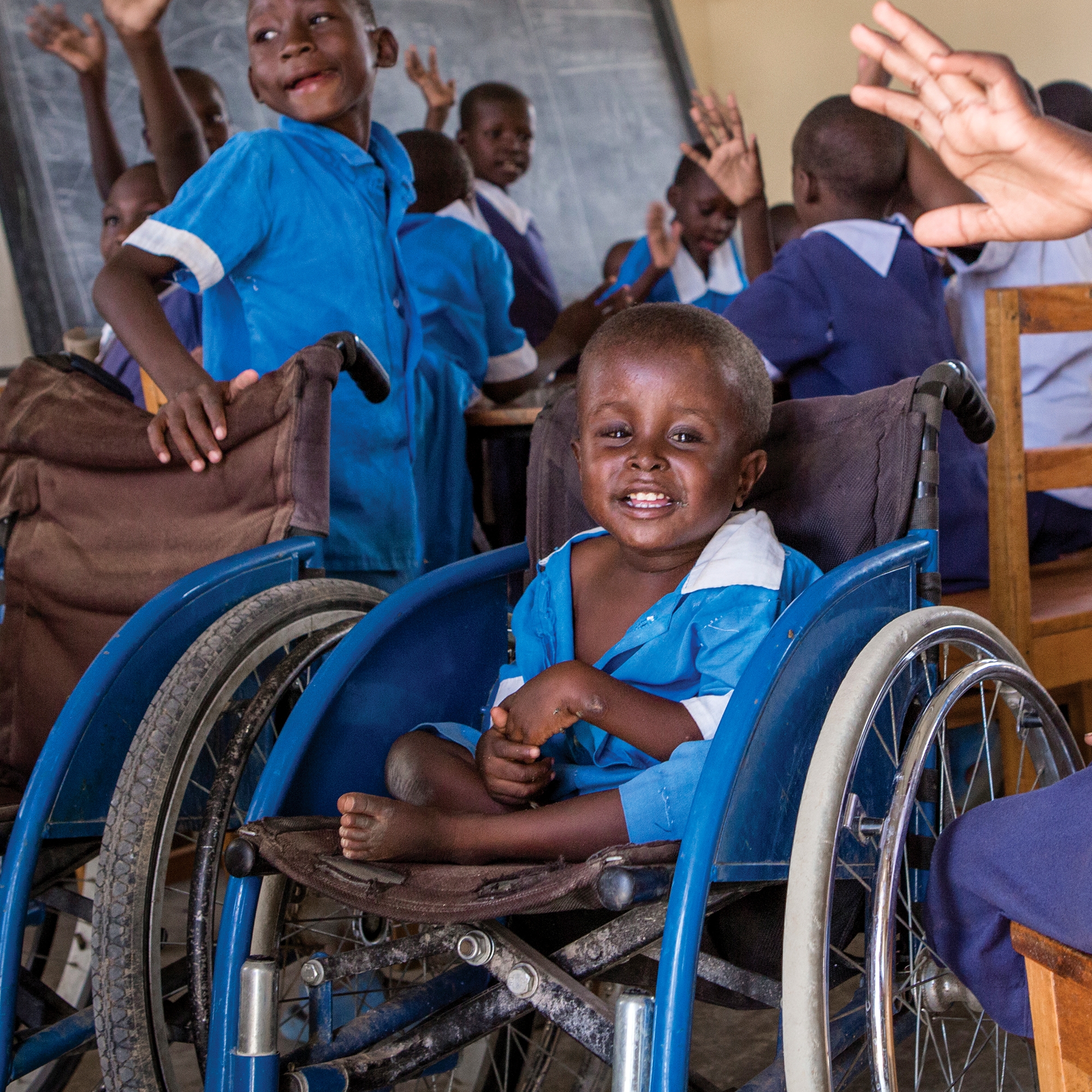 A classroom visit at St. John Paul II Home for Physical Impairment in Lokichar, Kenya. Save the Children partners with the center, to support outreach activities, identify children with disabilities and spread awareness and acceptance in their communities. Save the Children also pays for adaptive items that can help them lead normal lives such as prosthetic limbs, walking aids and specialized shoes. Photo credit: Jonathan Hyams/Save the Children, June 2016.