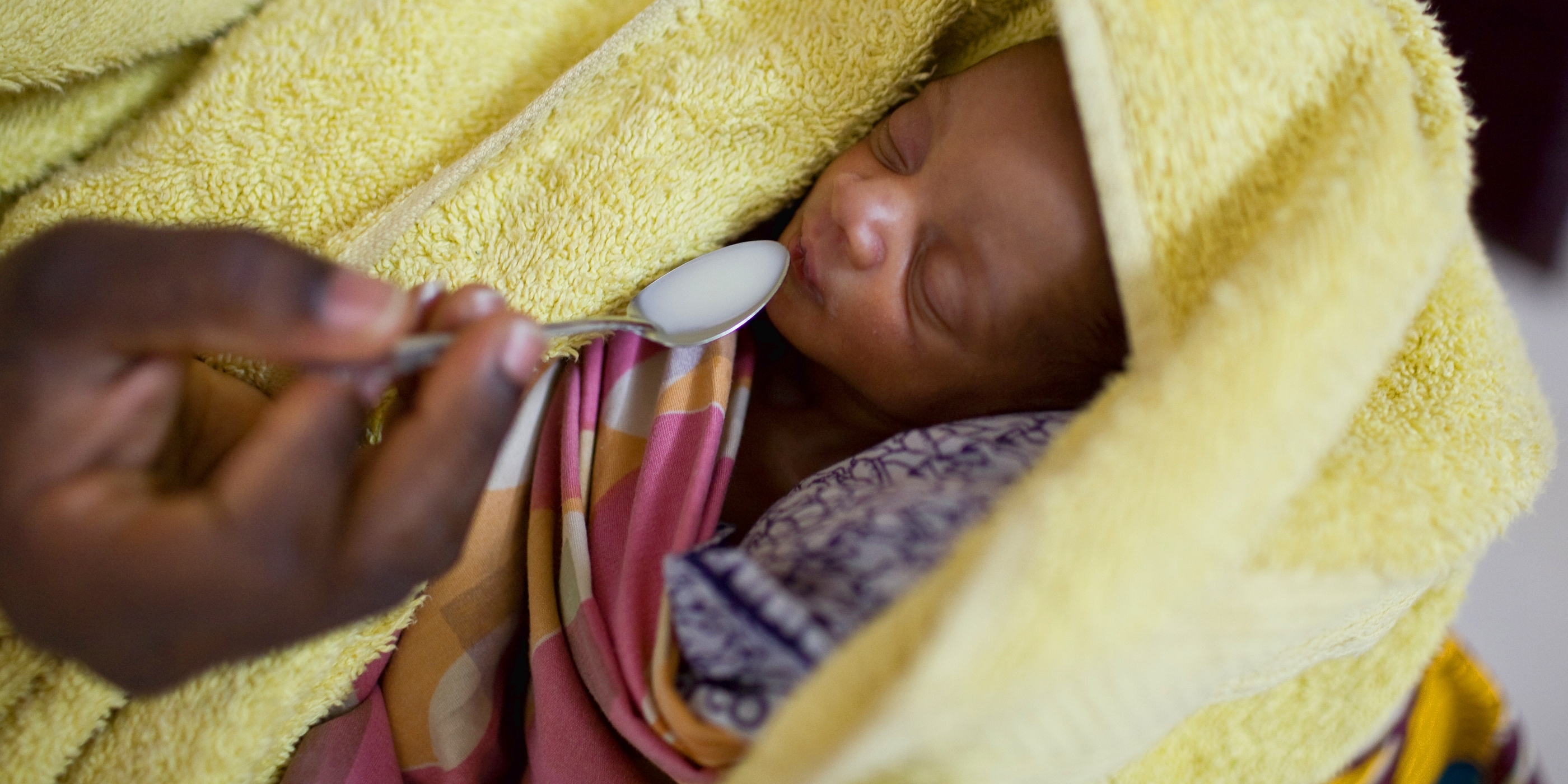 An eleven-day-old baby is cared for with help from a grant from the Bill and Melinda Gates Foundation. The babies were born one week premature and one weighed 4.1 pounds and the other 4.4 pounds. Photo Credit: Joshua Roberts/Save the Children 2010