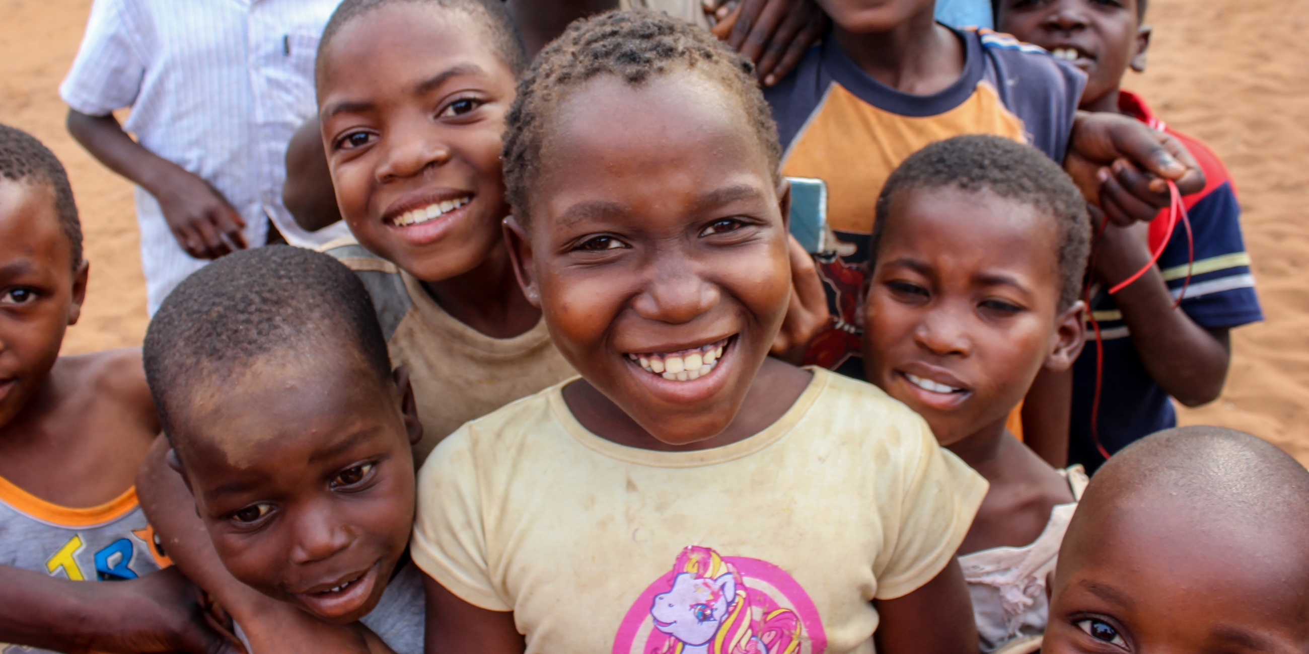 A group of Mozambique children smiling.