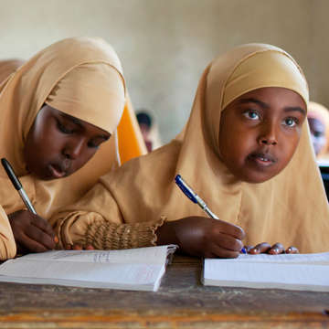 These two 6th grade girls are getting an education in a classroom in Borama, Somaliland. Photo Credit: Anna Kari/Save the Children 2012.
