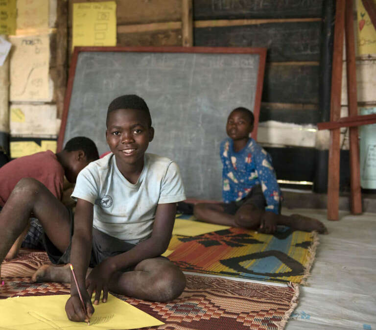 Munguiko*, 14, takes part in activities at the Save the Children space in Rwamwanja refugee settlement. 