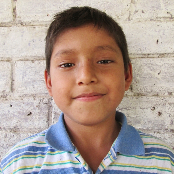 8-year-old Anderson hadn’t started school because he didn’t have a birth certificate. In his community in El Salvador, many families can't afford necessary paperwork when a child is born, and later find that the child can't attend school without one. Because education is an undeniable right for all children, Save the Children staff worked with the principal to enroll Anderson and his younger sister, and provided uniforms and school supplies to both kids. Photo credit: Save the Children, July 2015.