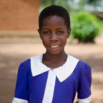 Young Blandhina in Malawi loves learning, thanks to a Save the Children Child Sponsorship program. She wants to be a radio announcer one day. Photo Credit: Save the Children in Malawi