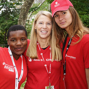 Save the Children celebrated their first annual Bridge the Gap Challenge on October 12th in New York City, to promote gender equality here in the US and around the world. Hundreds of participants walked over the Brooklyn Bridge as part of the fundraiser to help girls in need. Pictured here from left to right are Save the Children beneficiary Keren, Cecilia, CEO Carolyn Miles, and Anxhela. Photo credit: Matthew Morrison/Save the Children 2019.