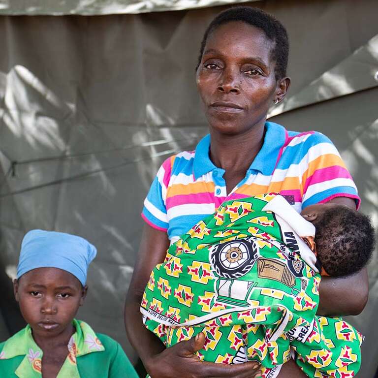 Mother and children receive emergency treatment in Mozambique.