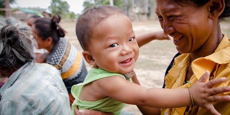 A smiling baby in Laos