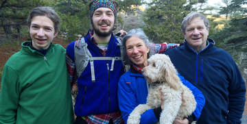 Forrest and Marcie Tyre Berkley pose for a photograph with their children and family dog. Photo Credit: Berkley Family 2015.
