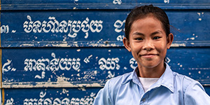 A portrait of Ratana, age 12, at her school in Cambodia