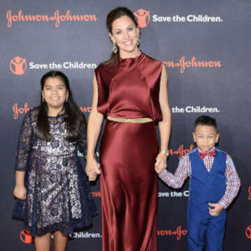 Save the Children program participants Sophia and Jakob pose for a photo with Jennifer Garner at the 6th annual Save the Children Illumination Gala at the American Museum of Natural History on November 14, 2018 in New York City. Photo by Noam Galai/Getty Images for Save the Children