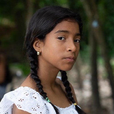A portrait of Luisa, a girl on the move.