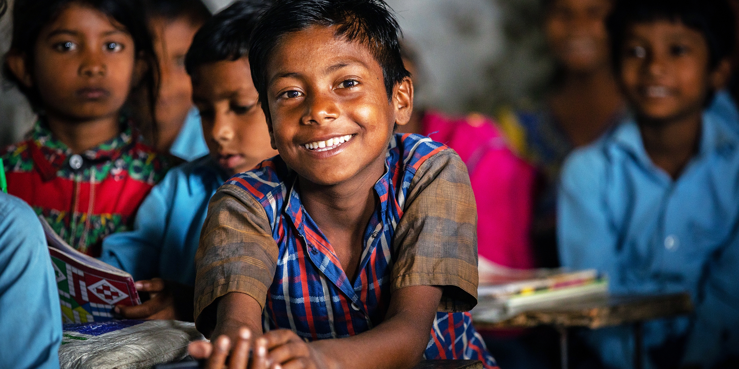 A 7-year-old boy participates in a math lesson at his community school in the Sarlahi district of Nepal. Photo credit: Victoria Zegler / Save the Children, May 2018. 
