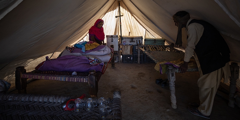 Pakistan, a family's house that was destroyed in the Pakistan floods, now lives with his wife and five children in a tent provided by Save the Children.