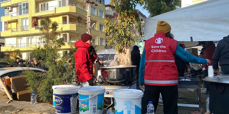 Turkey,  a photo showing Sae the Children works distributing food.