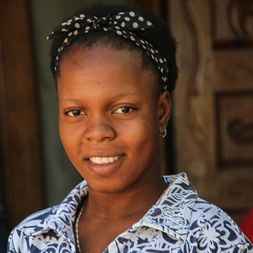 A portrait of Julienne, a previously sponsored child, now is a nurse in Dessalines Haiti.