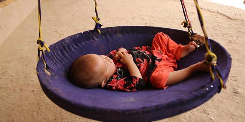 Afghanistan, a little baby girl suffering from malnutrition gets help from the Save the Children Mobile Health Team