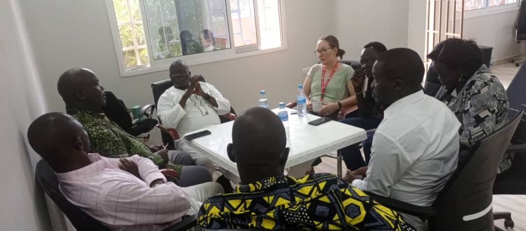SCUS staff member meeting with members of the LRPF secretariat in Juba in September 2023.