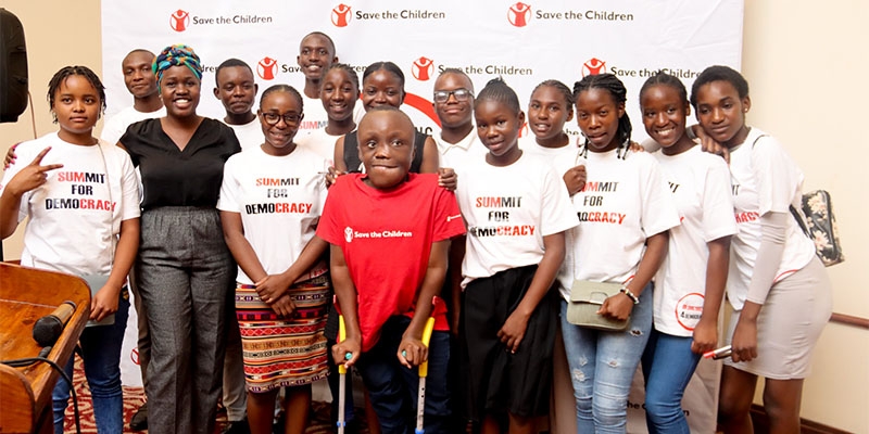 Child activists stand together at the Summit for Democracy 2022 in Zambia