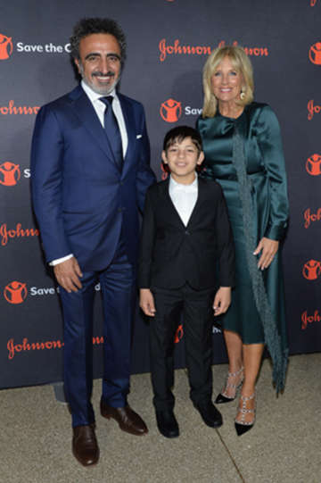Chobani Founder and CEO Hamdi Ulukaya, Syrian Refugee and Save the Children beneficiary Mahmoud Aloqla, and Save the Children Board Chair Dr. Jill Biden attends the 5th Annual Save the Children Illumination Gala at the American Museum of Natural History on October 18, 2017 in New York City. (Photo by Noam Galai/Getty Images for Save The Children