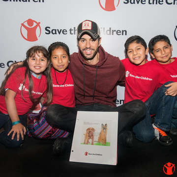 Enrique with children from Save the Children’s programs in Guatemala.  Photo Credit:  Save the Children