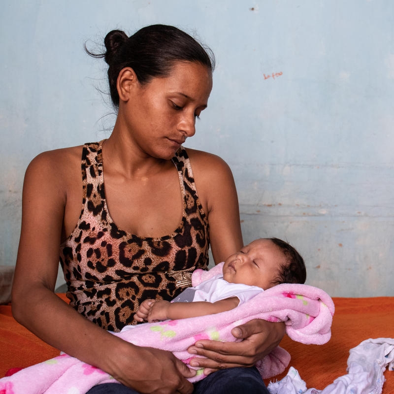 Ana, 26, moved from Venezuela to Colombia in 2019 during her high-risk pregnancy, and received pre- and post-natal care from Save the Children’s health clinic. Credit: Sacha Myers/Save the Children. 