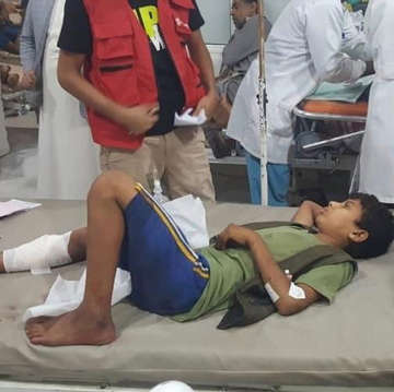 A boy wrapped in bandages is treated after an attack in Sada'a Yemen.
