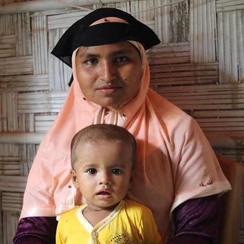 A mother and her daughter access medical services at Save the Children's health center in Cox's Bazar.