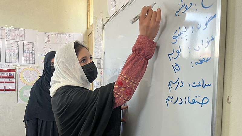 A girl attends Save the Children’s Community Based Education classes in Afghanistan 