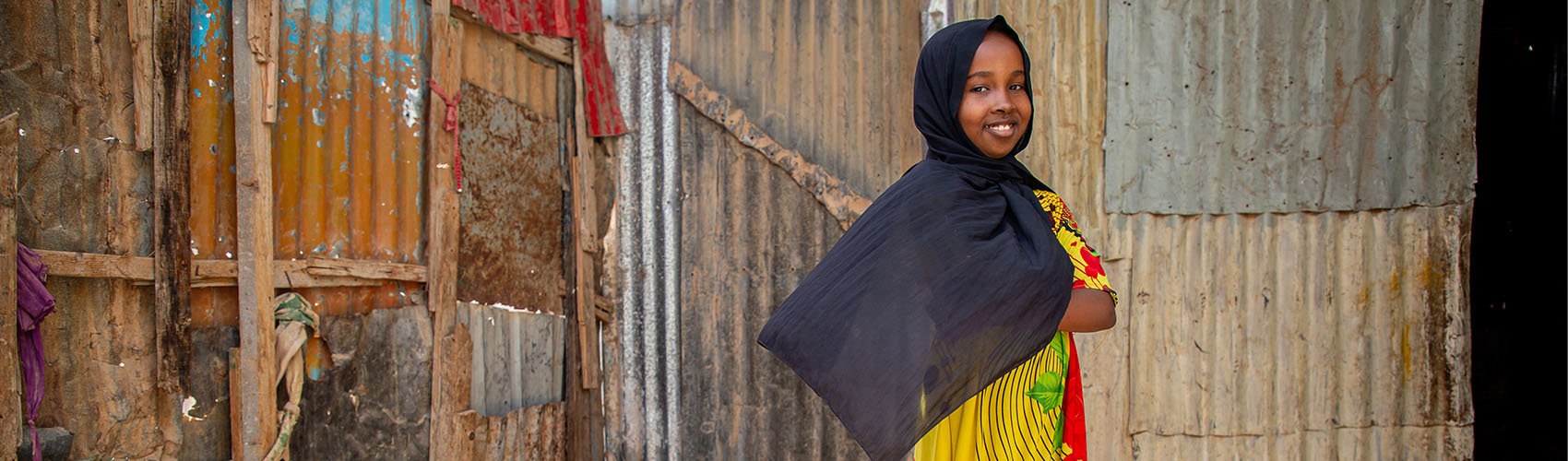 Sahra lives in Somalia and she likes to draw houses.