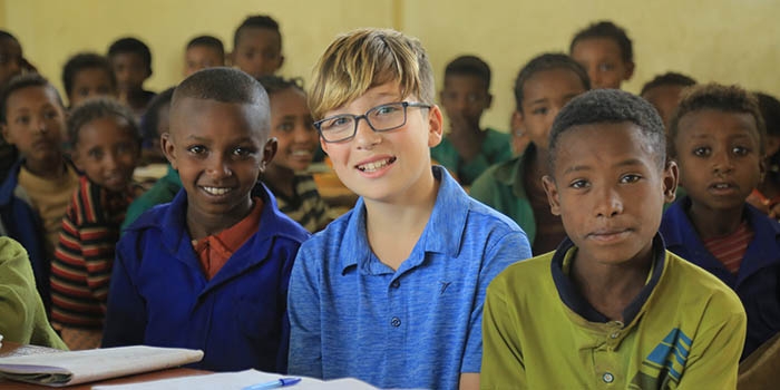 Sacha visiting Ethiopia through Save the Children's sponsorship program.