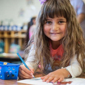 Five-year-old Madison colors with colored pencils in her preschool classroom. She attends Save the Children's Early Steps to School Success literacy program offered at her school in Colorado. Photo credit: Susan Warner / Save the Children, April 2016. 