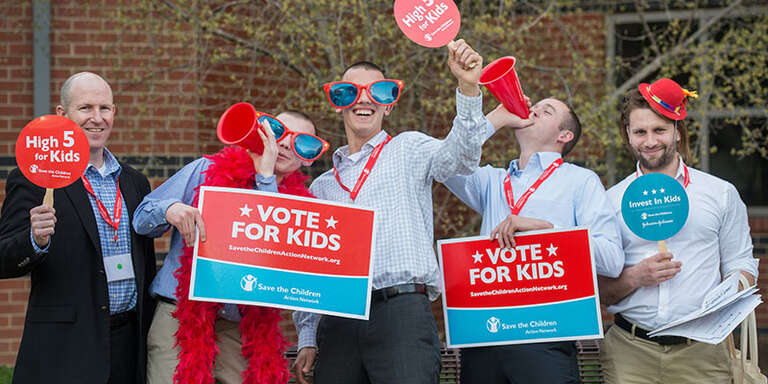 A group of teenagers with save the children sunglasses and bull horns at the Advocacy Summit in Washington, D.C.