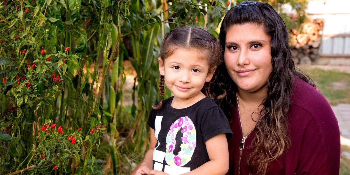 Analia, 3, with her mom during a home visit as part of Save the Children’s signature Early Steps to School Success program in Central Valley California.