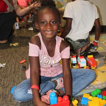 Children displaced by Hurricane Florence were able to rest and play in the Child Friendly Spaces set up in evacuation shelters by Save the Children. Photo credit: Jeremy Soulliere / Save the Children, Sept 2018.