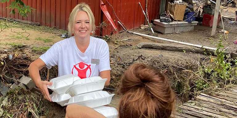 In Kentucky, a Save the Children staffer delivers food to families imapcted by the flooding.