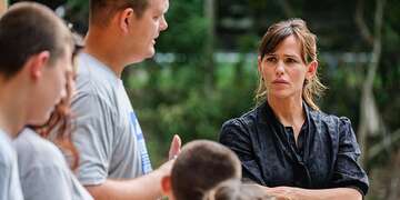 Jennifer Garner listens to a family in Kentucky whose home was devastated by the recent flooding.