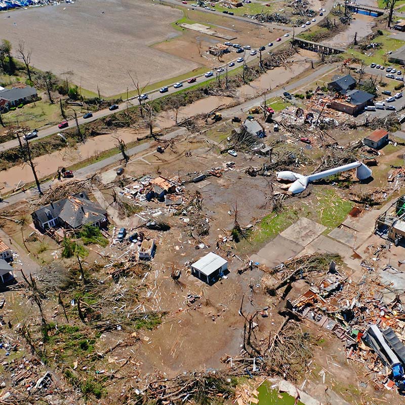 An aerial view of tornado damage, including a down water tower, in Rolling Fork, Mississippi.