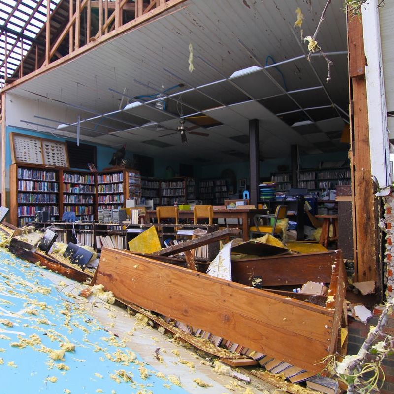 In Florida, a school building is torn wide open after Hurricane Michael. 