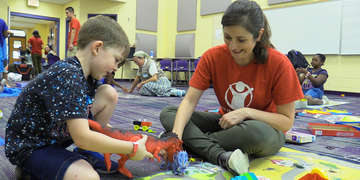 Children play with Child Friendly Space volunteers in the Florida Panhandle in the aftermath of Hurricane Michael. Save the Children’s Child Friendly Spaces are safe play areas in evacuation shelters where kids can be kids again, express themselves and begin to cope. Thanks to the generous support of our donors, we continue to help children, families and communities most affected by Hurricane Michael. Photo Credit: Save the Children / October 2018