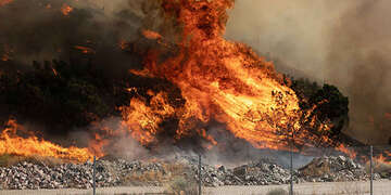 Wildfires burn across California.