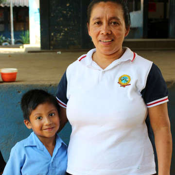 Ricardo with his mother Yeni are both benefitting from sponsorship programs in El Salvador. Photo Credit: Save the Children in El Salvador