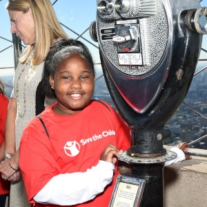 Miracle, a sponsored child from South Carolina, is shown here at the top of the Empire State Building. She was chosen to participate in a Day of the Girl event with Save the Children. Photo credit: Save the Children, 2017.