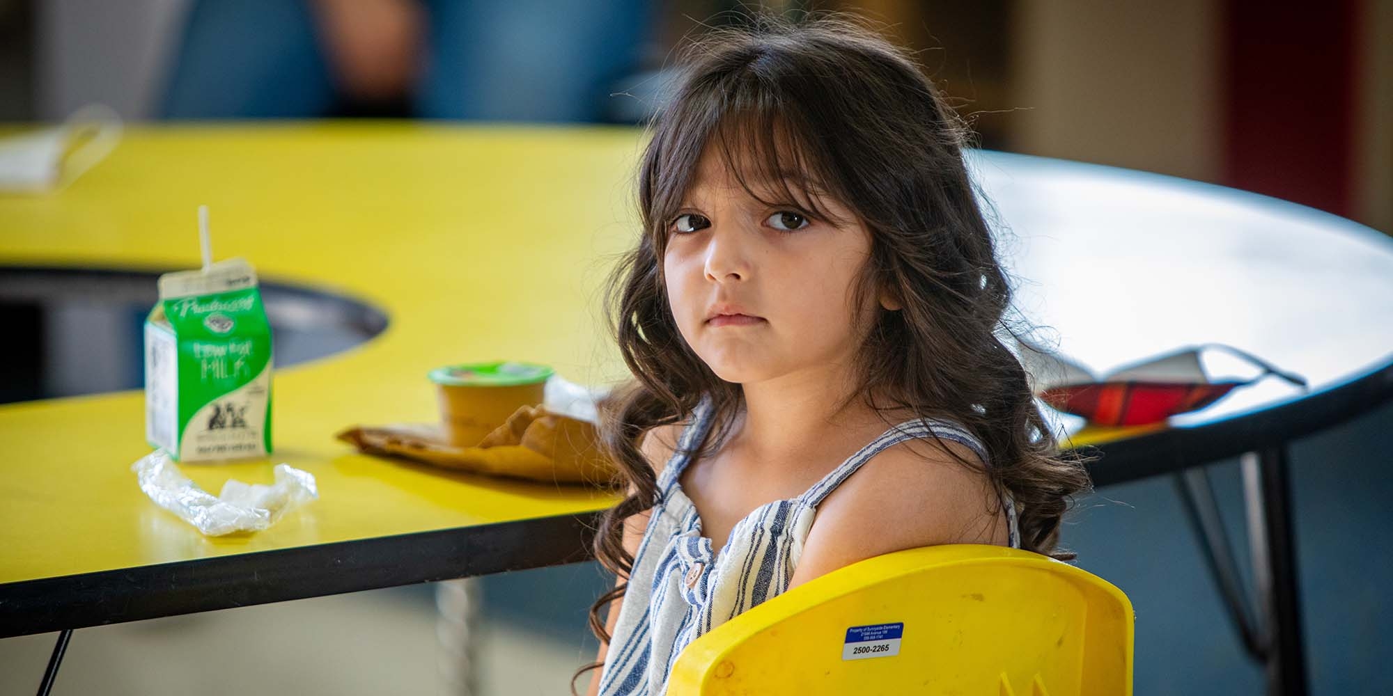 5-year-old Alexa takes a break from eating breakfast on Friday, May 27, 2021 in her pre-school classroom in California.